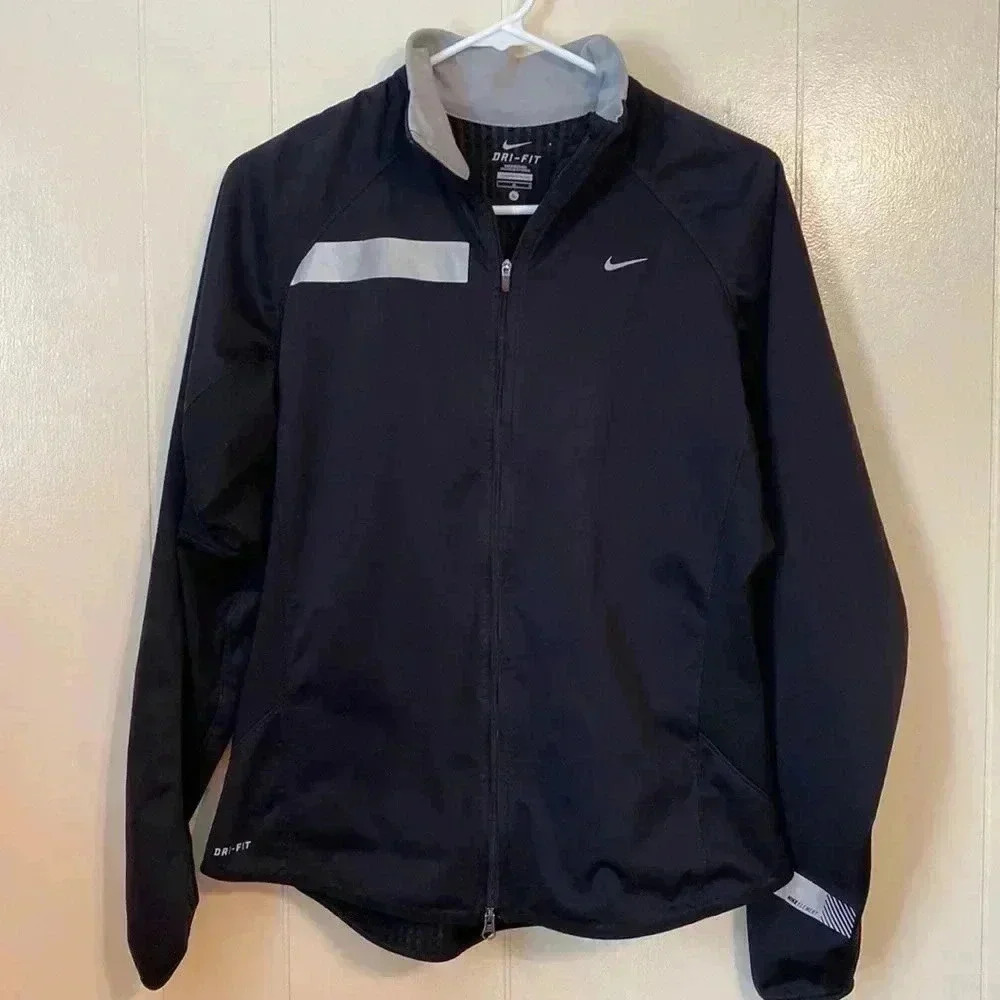 Woman’s Nike Element Dri-Fit Black Jacket in Size Large.